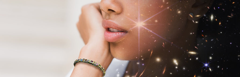 The magnificent Supernova bracelet with multi-color gemstones in various shapes and sizes.