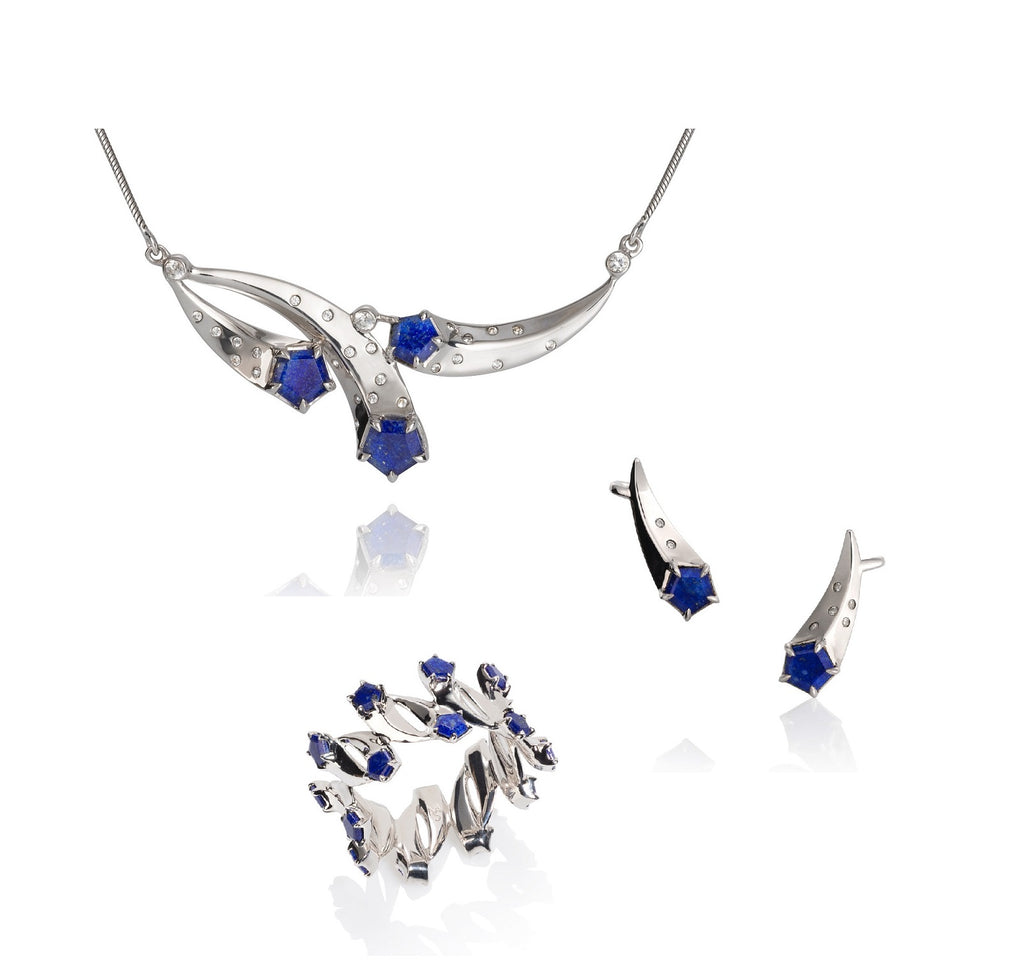 Three new designs from the Comet Collection in sterling and lapis with white zircons. Representing the meteors as they fly through the sky - the Triple Comet necklace, the post earrings and band  eternity ring